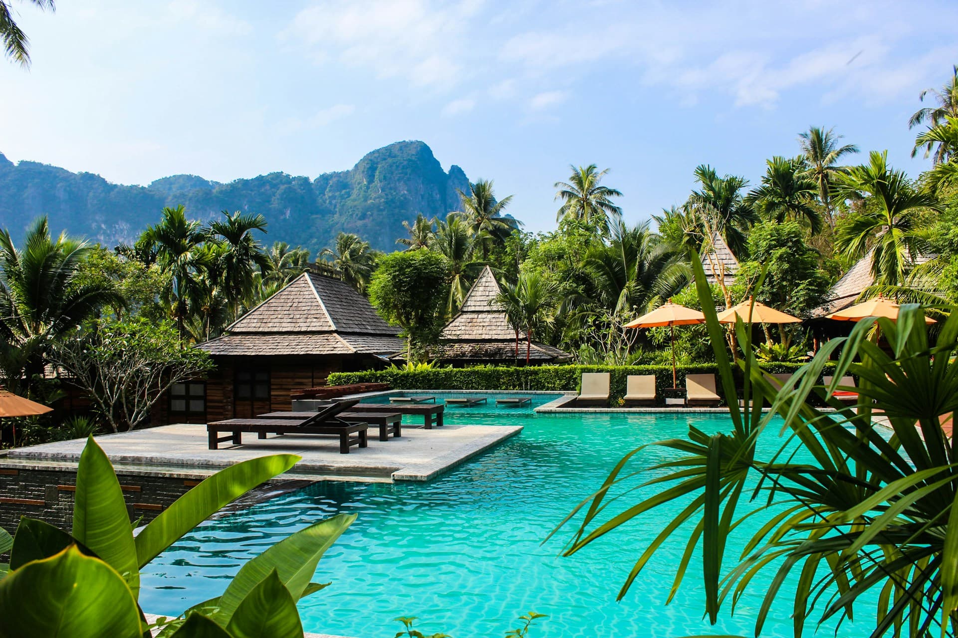 Luxury resort infinity pool at sunset
